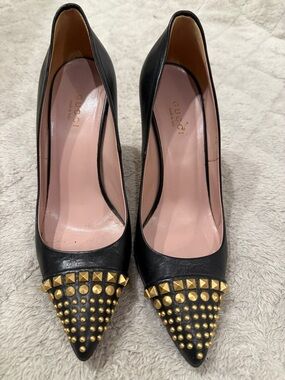 Gucci Black Leather Pointed Studded Pumps with Gold Accents